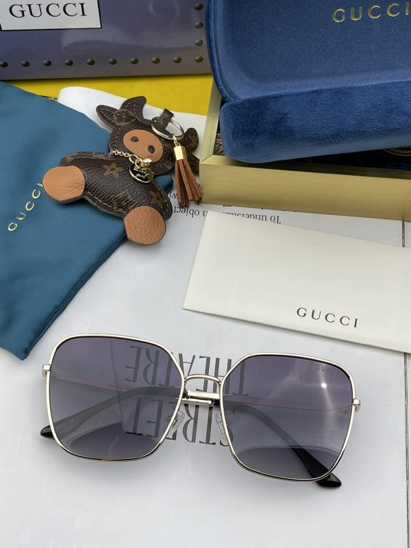 Gucci Silver Color Frame Black Lenses Sunglasses