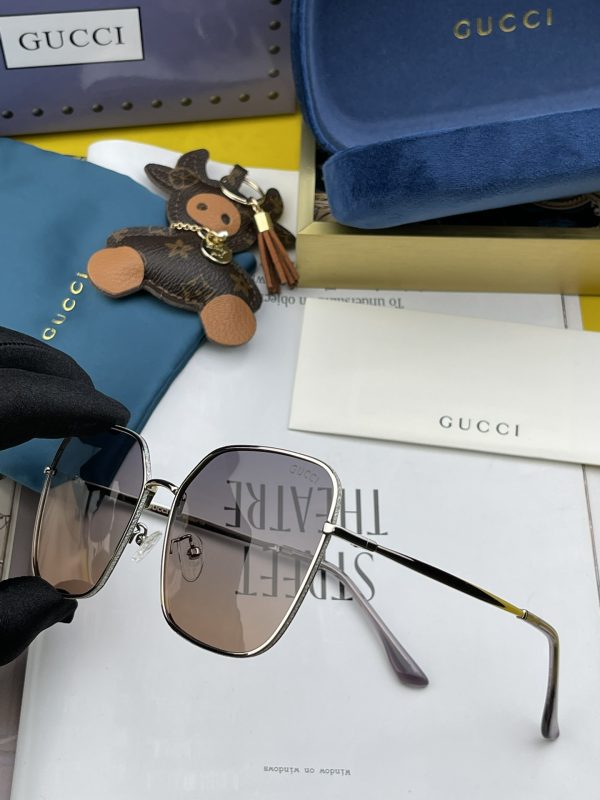 Gucci Silver Color Frame Black Lenses Sunglasses
