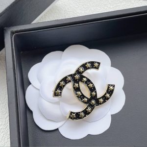 CHANEL CC BROOCH BLACK WITH MANY SMALL STARS