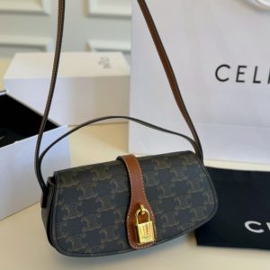 CELINE CLUTCH ON STRAP TABOU IN TRIOMPHE CANVAS AND CALFSKIN TAN 20CM 10I592DQ2 04LU