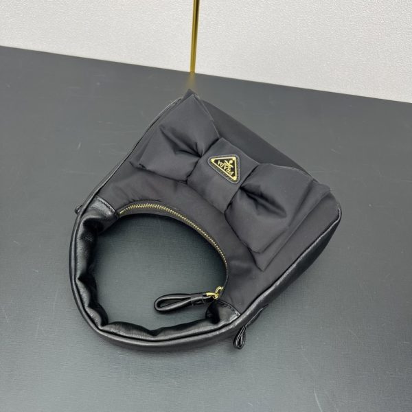PRADA RE NYLON AND NAPPA MINI BAG WITH BOW BLACK 21CM 1BC241 RP0C F0002 V OXO