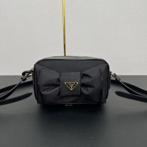 PRADA RE NYLON AND NAPPA MINI SHOULDER BAG WITH BOW BLACK 18CM 1BH166 RP0C F0002 V DXO