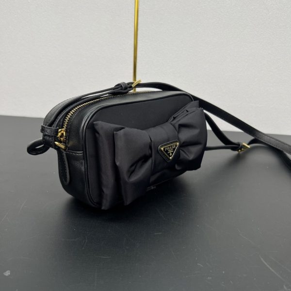 PRADA RE NYLON AND NAPPA MINI SHOULDER BAG WITH BOW BLACK 18CM 1BH166 RP0C F0002 V DXO