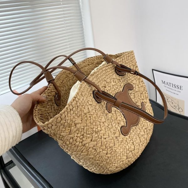 SUMMER SET: CELINE TRIOMPHE PANIER IN RAFFIA AND CALFSKIN TAN & SUNGLASSES METAL OVALE GOLD