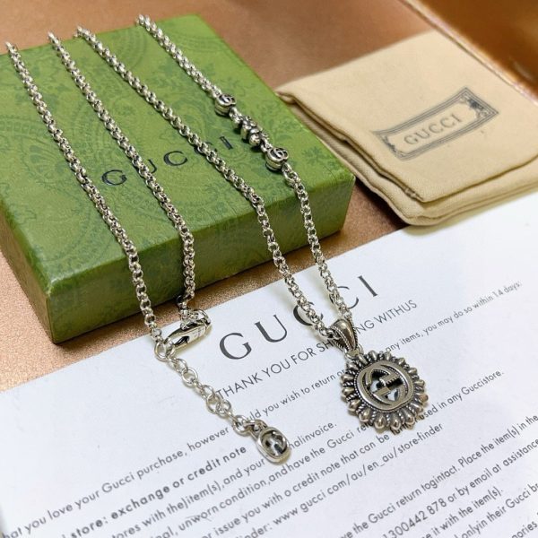 GUCCI INTERLOCKING G LOGO EMBELLISHED PENDANT STATION NECKLACE GOLD TONE