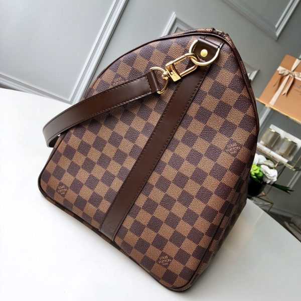 SUMMER SET: LOUIS VUITTON KEEPALL BANDOULIÈRE 55 DAMIER EBENE & ZIPPY WALLET DAMIER EBENE