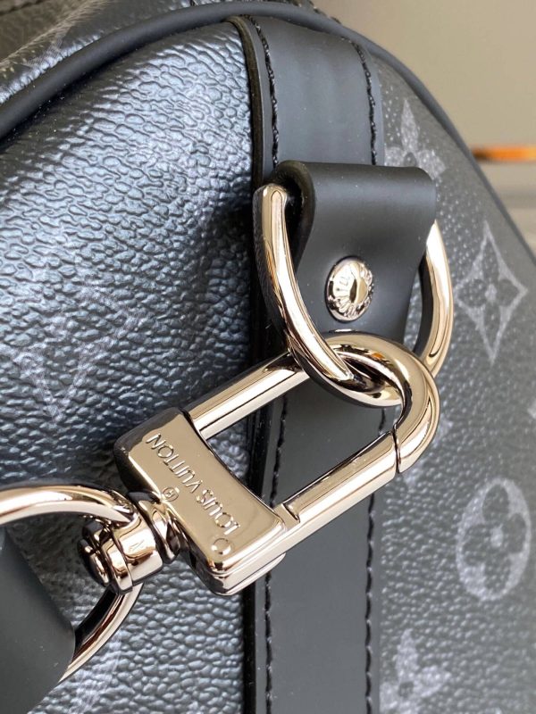 SUMMER SET: LOUIS VUITTON KEEPALL BANDOULIÈRE 50 MONOGRAM ECLIPSE & LONG WALLET MONOGRAM ECLIPSE TRUNK ZIPPY BLACK 19CM